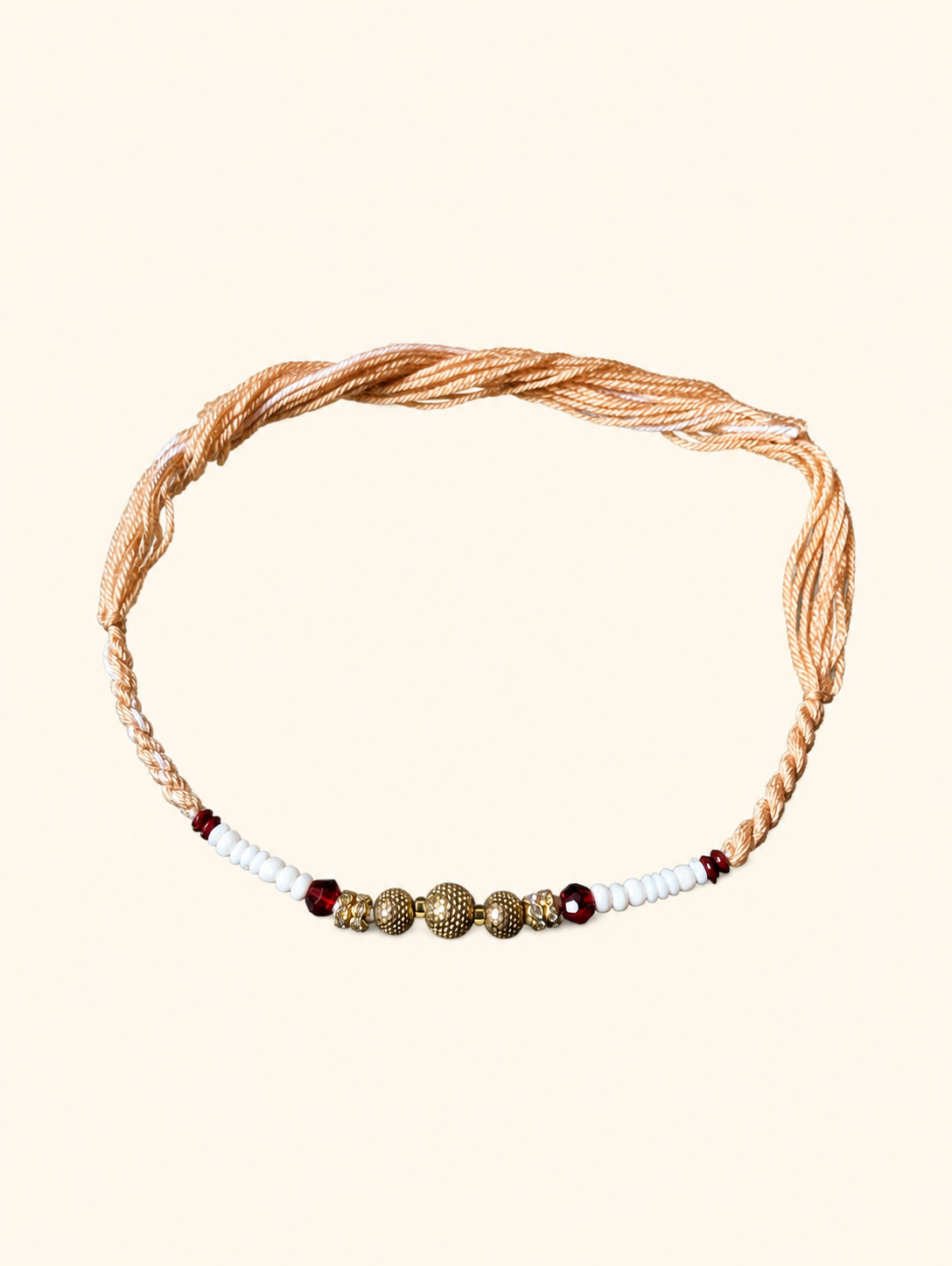 Dhaga Rakhi with Gold and Red Beads