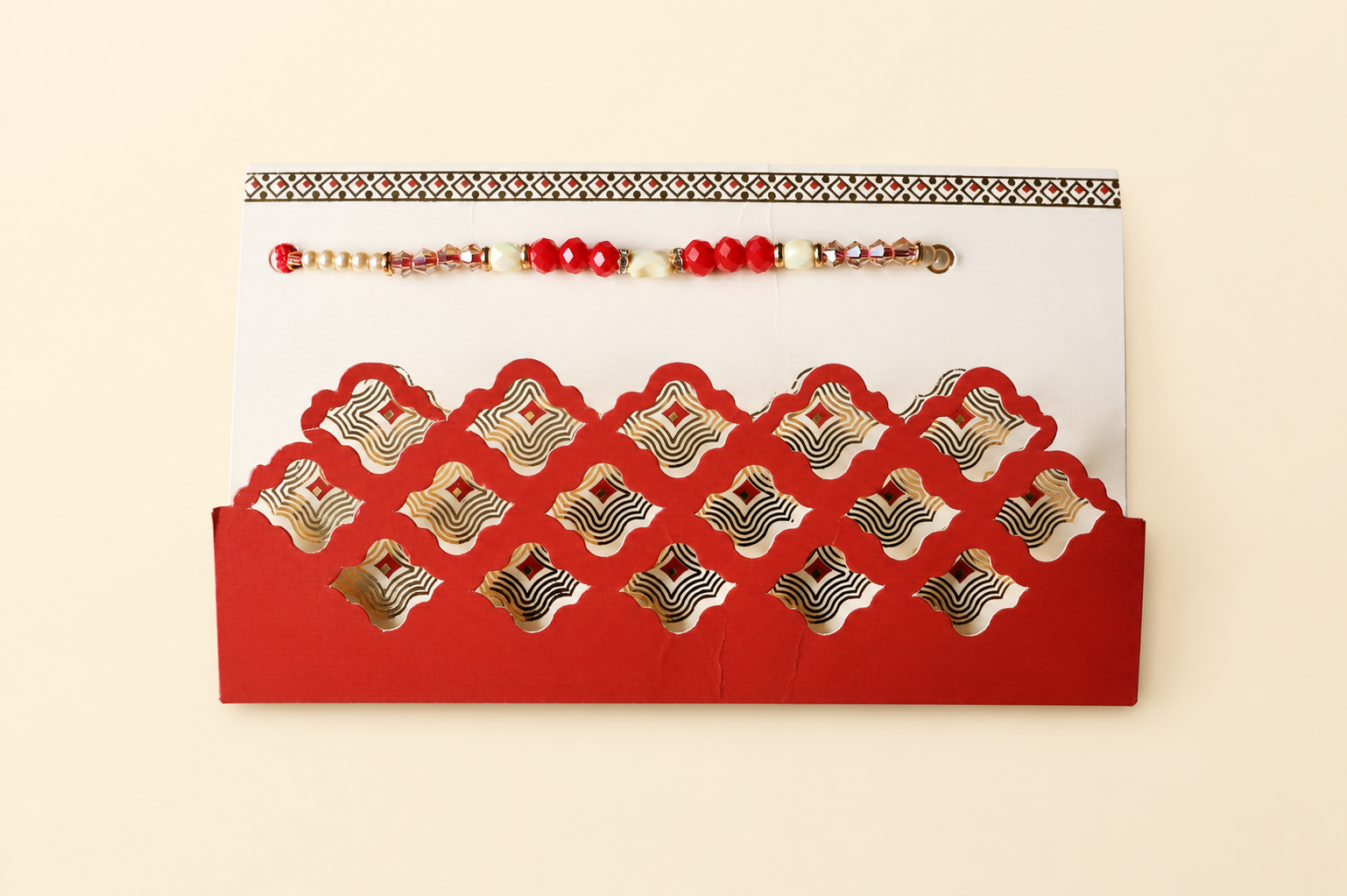 White Red Beads Rakhi with Decorative Envelope