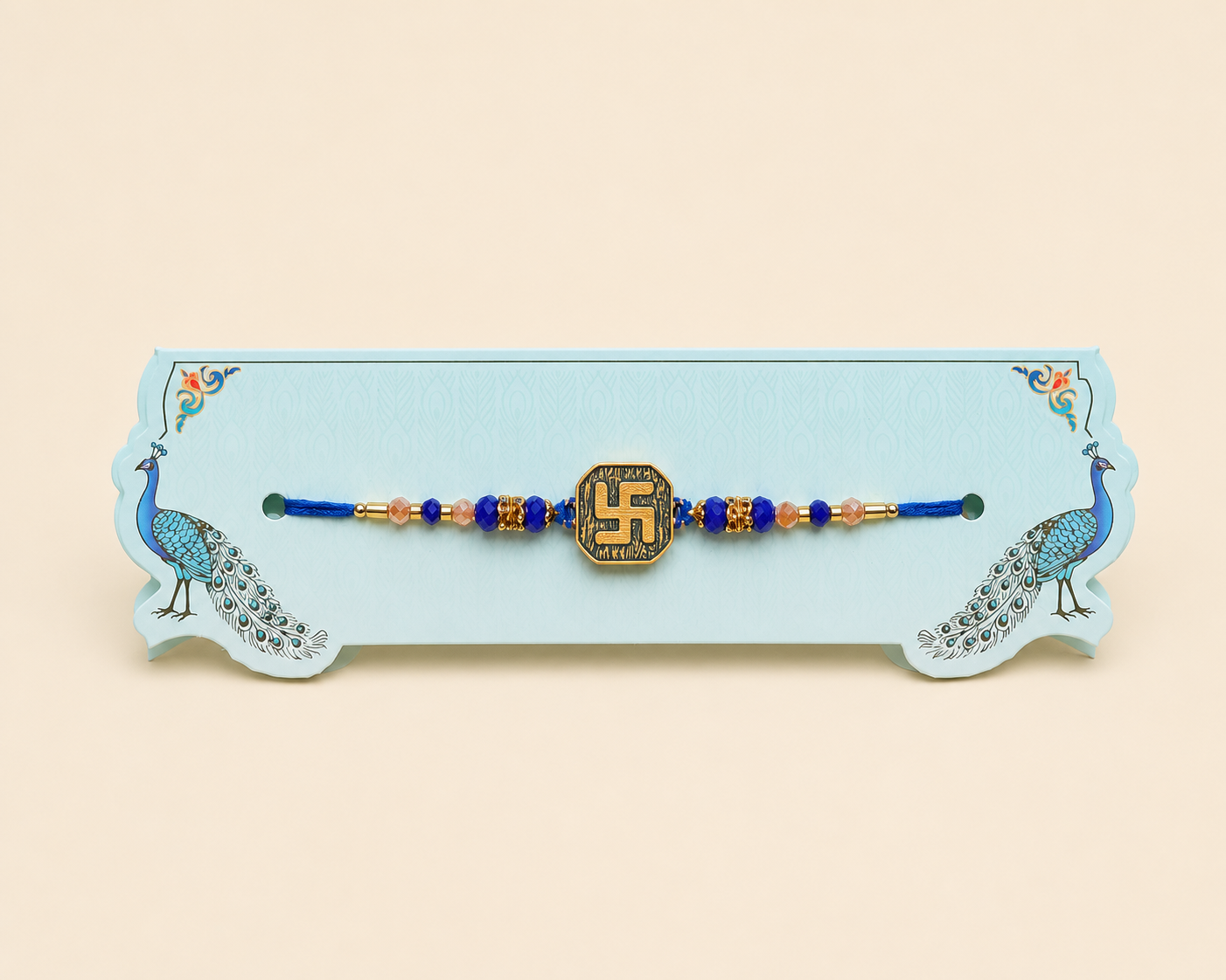 Swastik Rakhi with Blue Thread