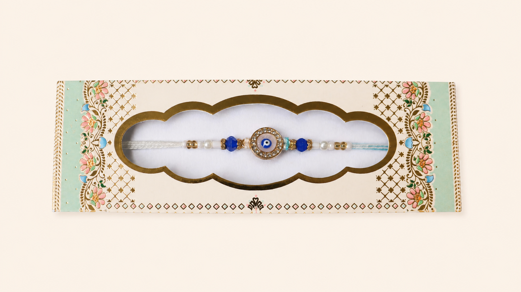 Evil Eye Rakhi With Blue Beads